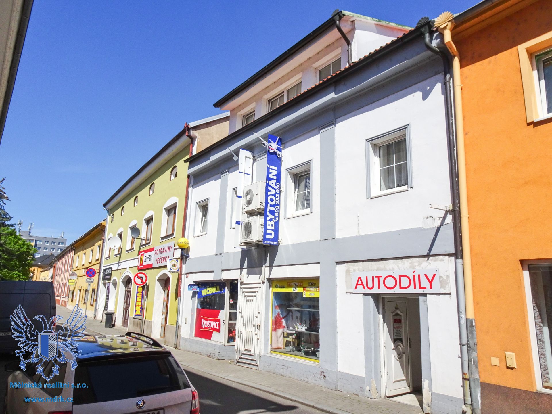 Prodej víceúčelového domu v centru Štětí - titulní obrázek--